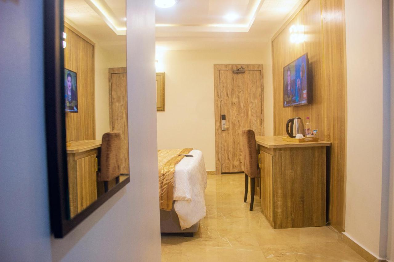 Swiss International Beland Hotel Owerri Bagian luar foto